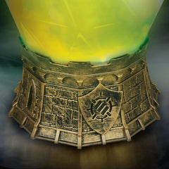 Medieval castle base supports the Sorcerer's Potion Light in a fantasy desk setup.