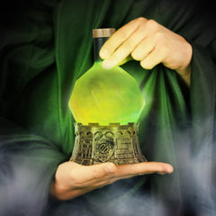 Compact potion light for portable mood decor on desks and shelves.