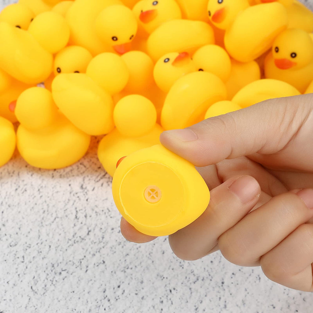 Ensbelei yellow bath ducks squeak softly to engage little ones.