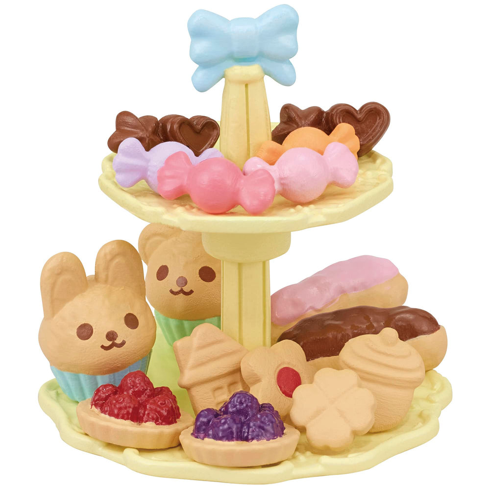 Cookies, cakes, and candies create delightful mini desserts for pretend gatherings.