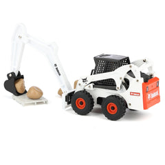 ERTL Bobcat Skid Steer rubber wheels roll smoothly on play surfaces