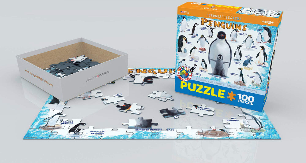 Child assembling EuroGraphics penguins puzzle; developing fine motor skills.