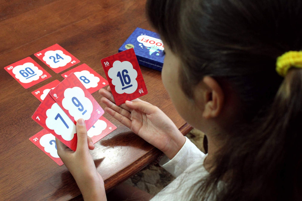 Family game night with Proof! Math Game on the table