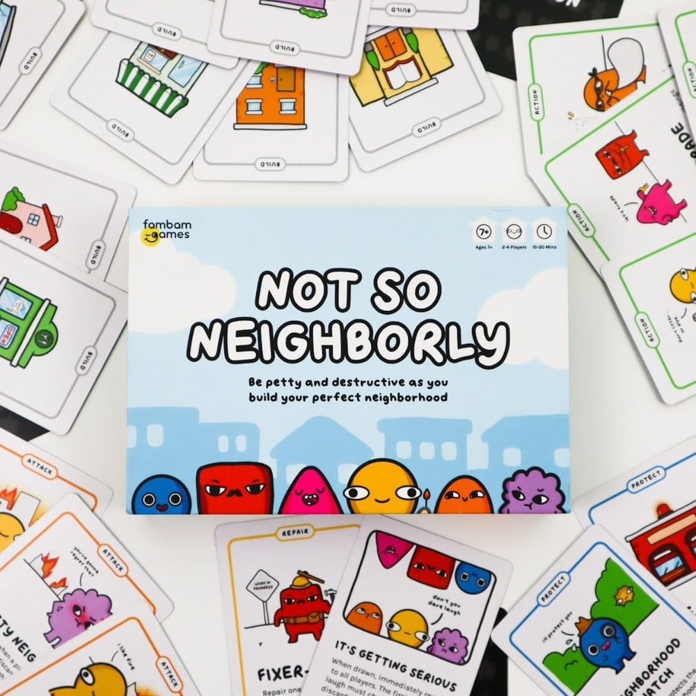Two to four players around a table playing Not So Neighborly energetically.