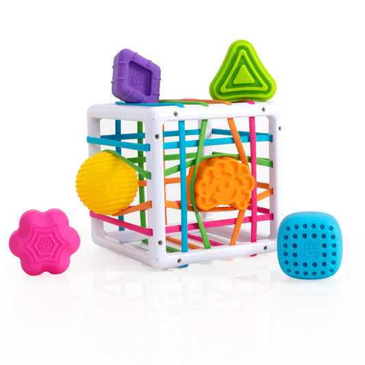 Fat Brain Toys InnyBin blocks and elastic bands for fine motor skills.