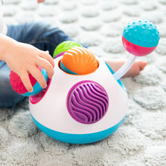 Fat Brain Toys Klickity push-and-pull motion supports fine motor skill development.
