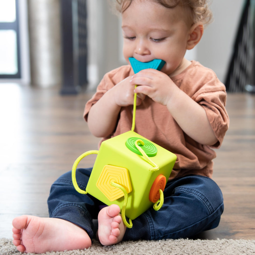 OombeeCube compact travel-ready design fits small hands.