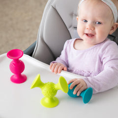 pipSquigz in a bath setting with suction cup on tub edge