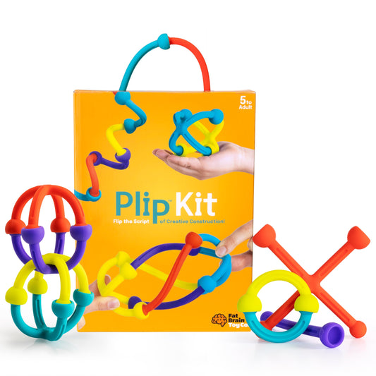 Fat Brain Toys Plip Kit pieces in bright silicone invite open-ended creative play.