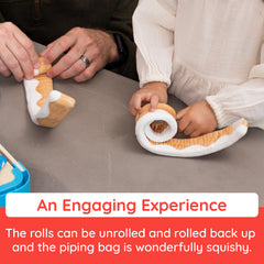 Fat Brain Toys Pretendables cinnamon roll plush rolls unrolled to inspire imaginative kitchen stories.