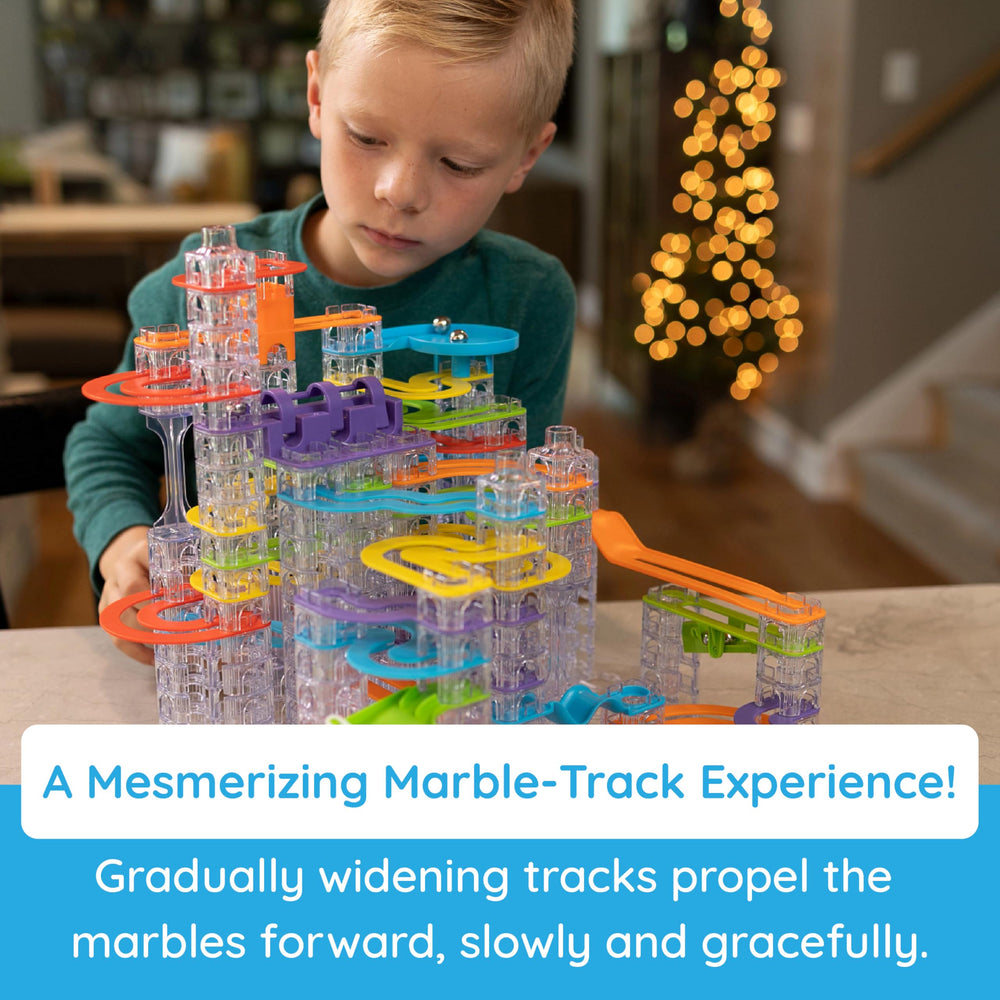 Fat Brain Toys Trestle Tracks Pro stairs track demonstrates multi-level descent for curiosity.