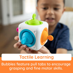 Fat Brain Toys Tugl Cube compact size fits pockets for on-the-go amusement.