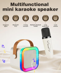 Feix g mini karaoke machine with two wireless microphones for duets.