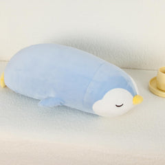 FFxiong 22-inch penguin plush as a body pillow for relaxed lounging