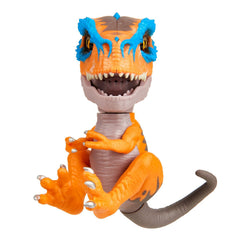 Fingerlings Untamed T-Rex Scratch orange roaring and chomping