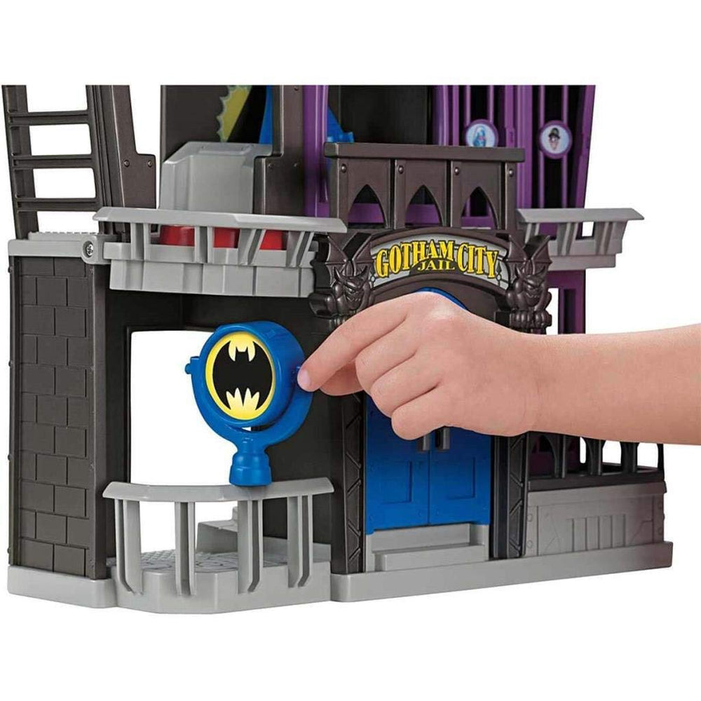 Fisher-Price Imaginext jail doors opening for a jailbreak scene