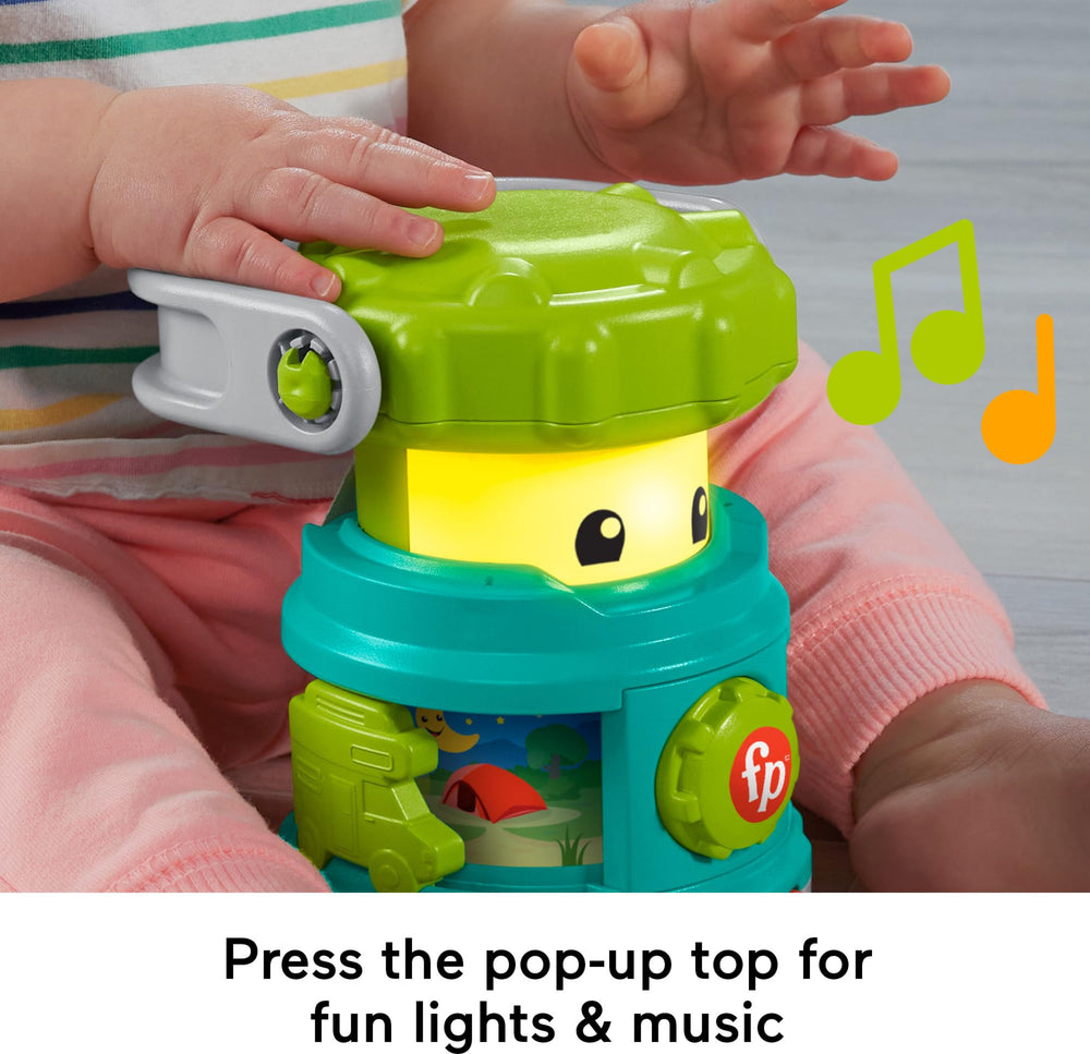 Fisher-Price Laugh & Learn Camping Fun Lantern pop-top activation lights and music.