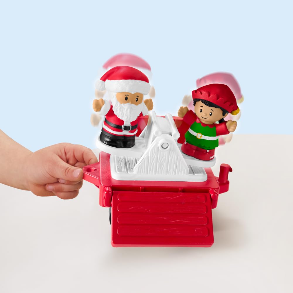 Fisher-Price Santa figure included for imaginative holiday storytelling.