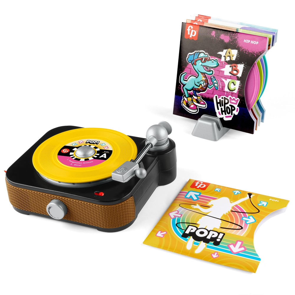 Fisher-Price Rockin’ Record Player turntable in action inspires imaginative play.