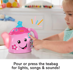 Fisher-Price tea set tray with puzzle treats encourages fine motor skills.