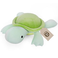 Florviv weighted turtle shell close-up showing soft green fabric for cozy hugs.