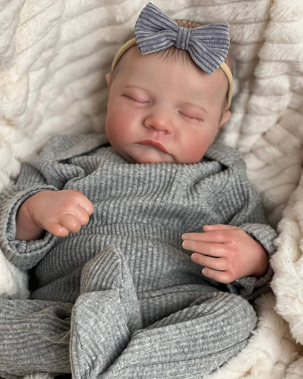 FOCKOF Realistic Reborn Baby Doll 18inch hand-painted hair enhances natural charm.