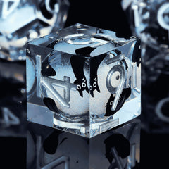 Hand-finished resin dice with visible inclusions highlight cat motifs