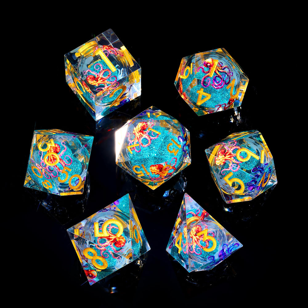 Froggod blue resin dice securely stored in a foam-protected jar.