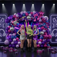 Froufing guitar-shaped foil balloons enhance concert-inspired décor