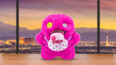Fuggler Mini Rascals soft plush finish enhances cuddle value.
