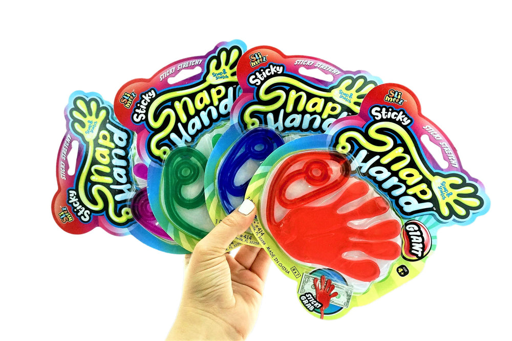Fun a Ton giant snap hand attached to a wall for sticky surface play
