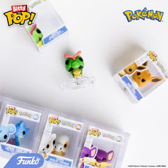 Funko Bitty Vulpix figure—small, colorful display piece.