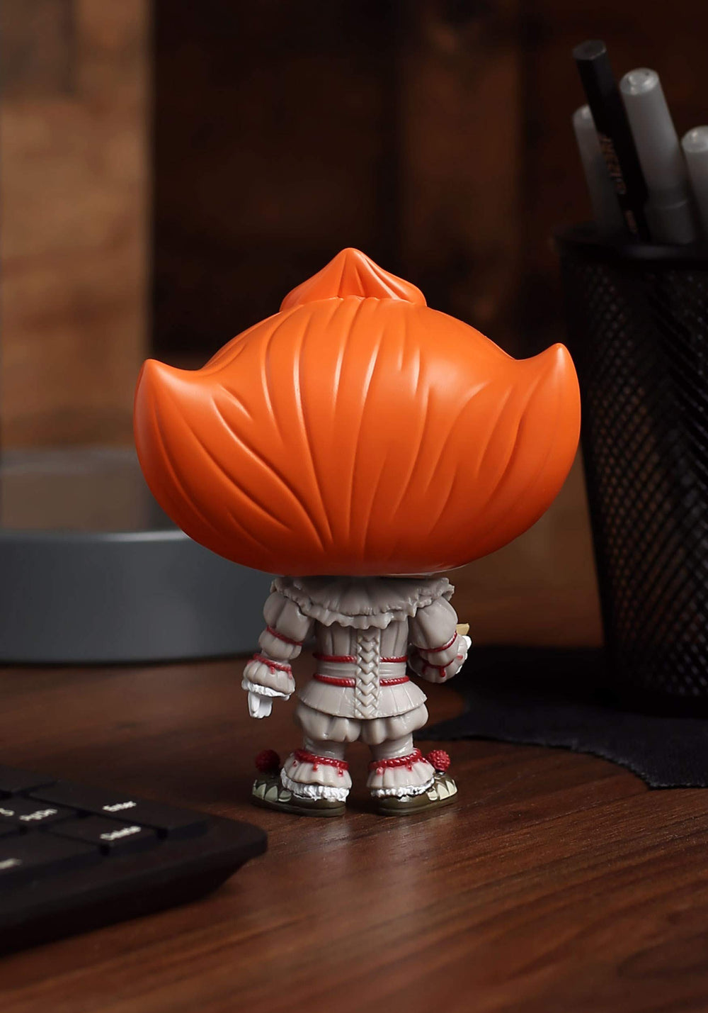 Close-up of Pennywise with Boat, premium vinyl and detail