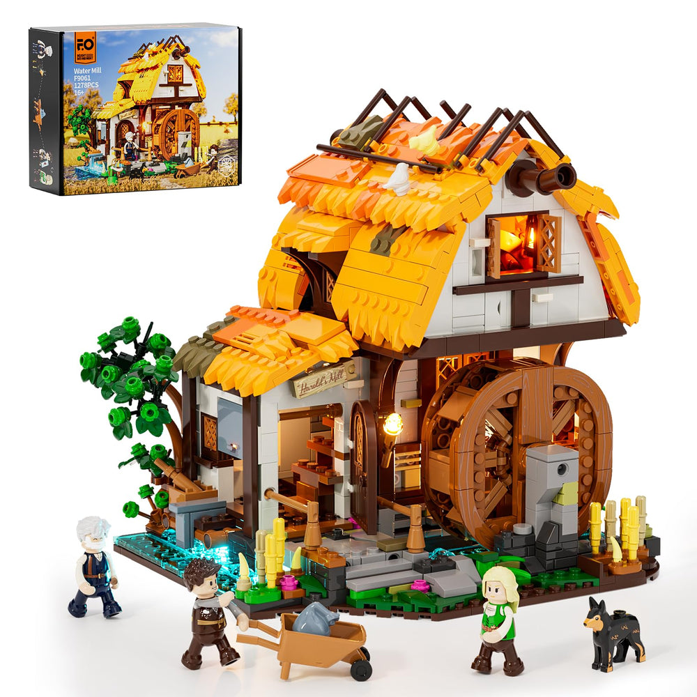 FUNWHOLE Medieval water-mill exterior shows a thatched roof beside a river for immersive display.