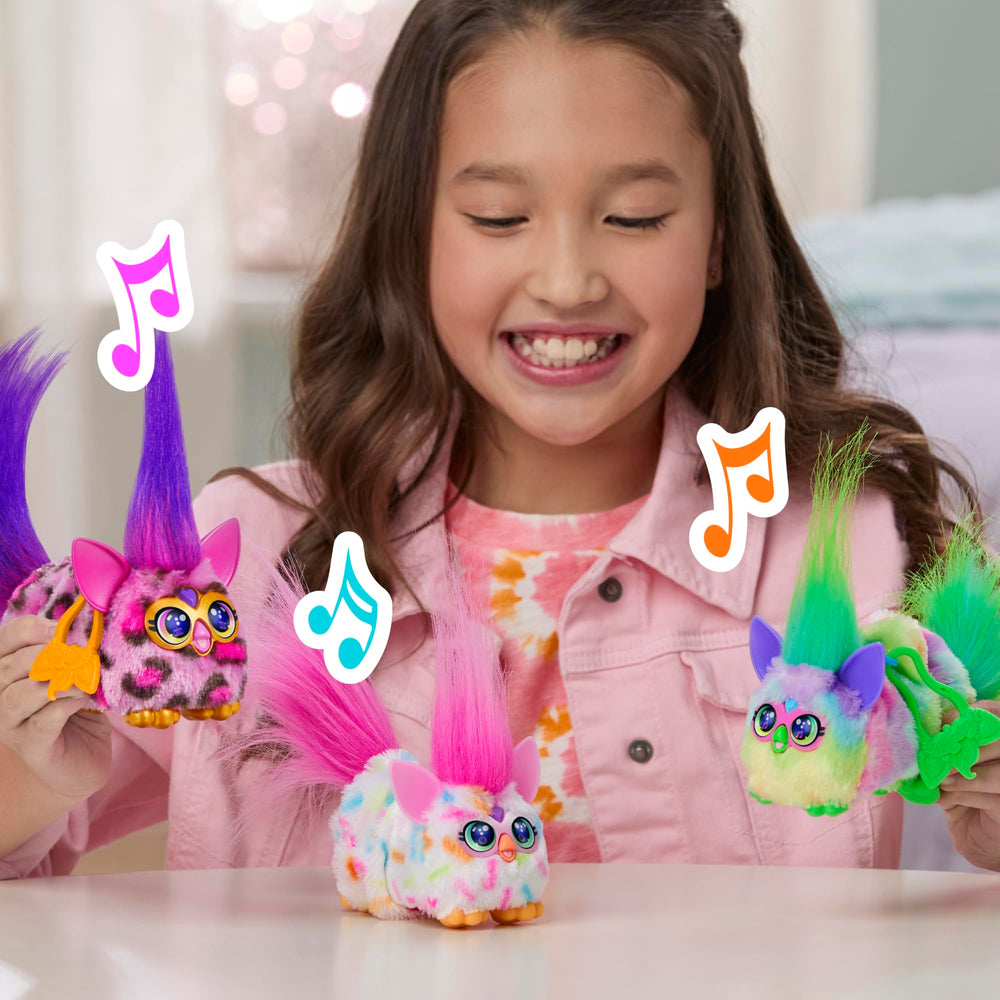 Furby DJ Furblets mouth noises illustrate fun feeding sounds during pretend play.