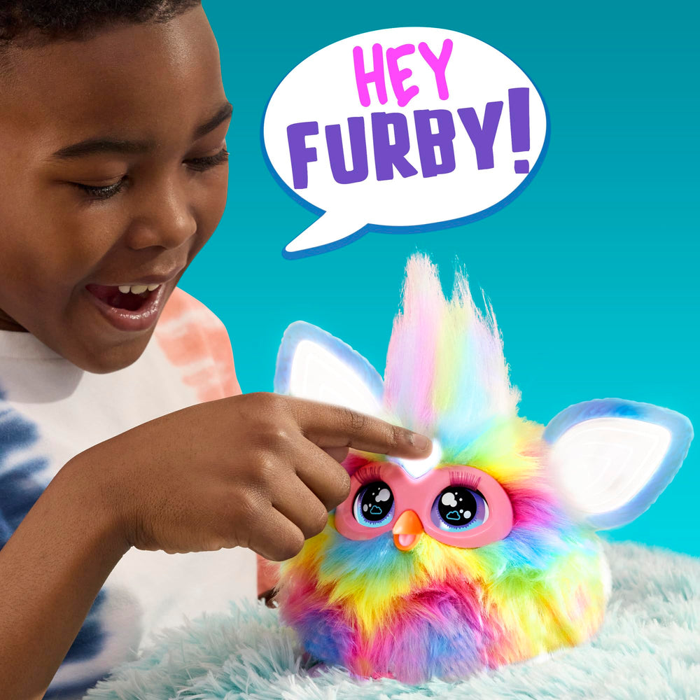 Furby interactive plush face responds to kids actions.