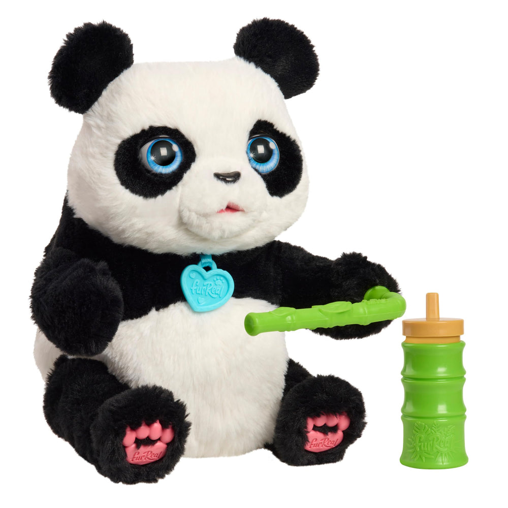 FurReal Coco front view showing plush black-and-white fur and sparkly blue eyes for cuddly play