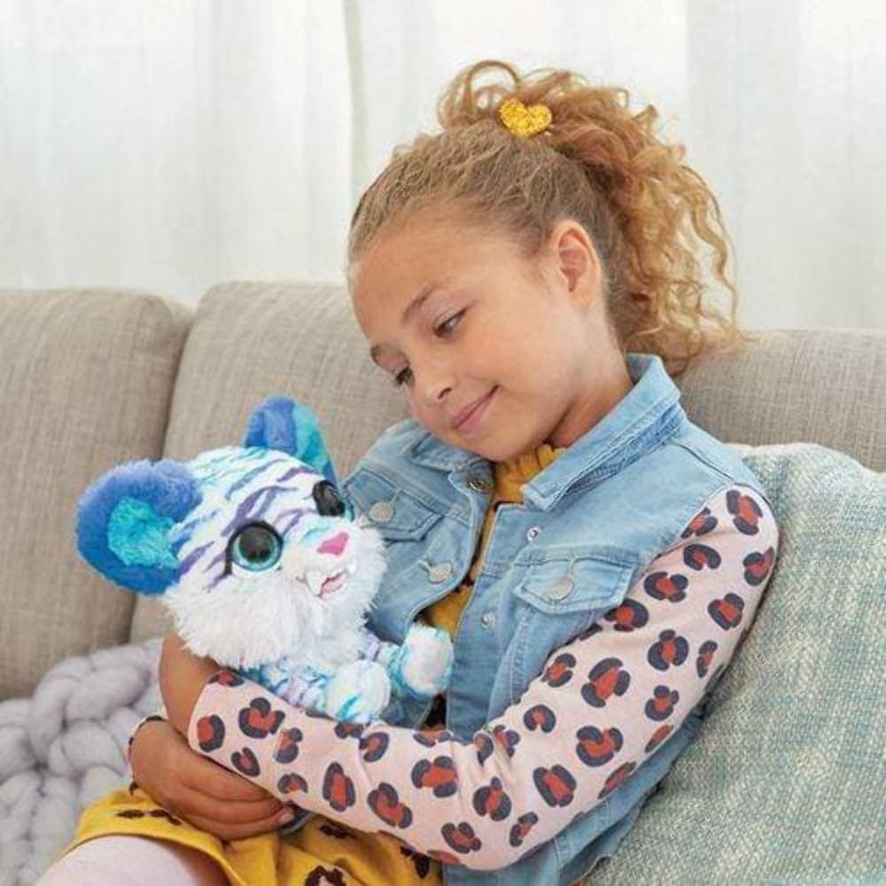 FurReal North sabertooth kitty snuggle pose with glowing heart for comforting interaction.