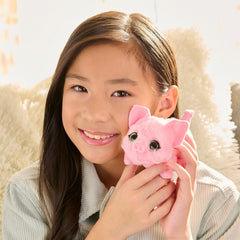 furReal piglet closeup of sparkly green eyes and soft fur for tactile appeal