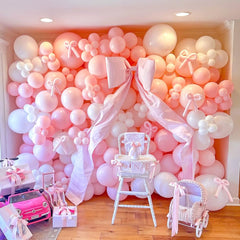 Futureferry baby shower decor creates soft pink ambiance and joy.