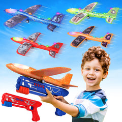 Fuwidvia green foam airplane gliding outdoors for active play
