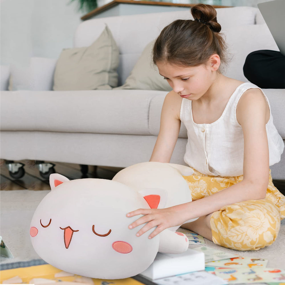 FUYU cat stuffed animal adds kawaii charm to bedroom decor.