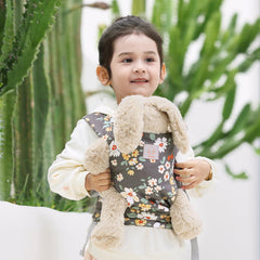 GAGAKU toy baby carrier worn by child demonstrates adjustable straps for growing kids.