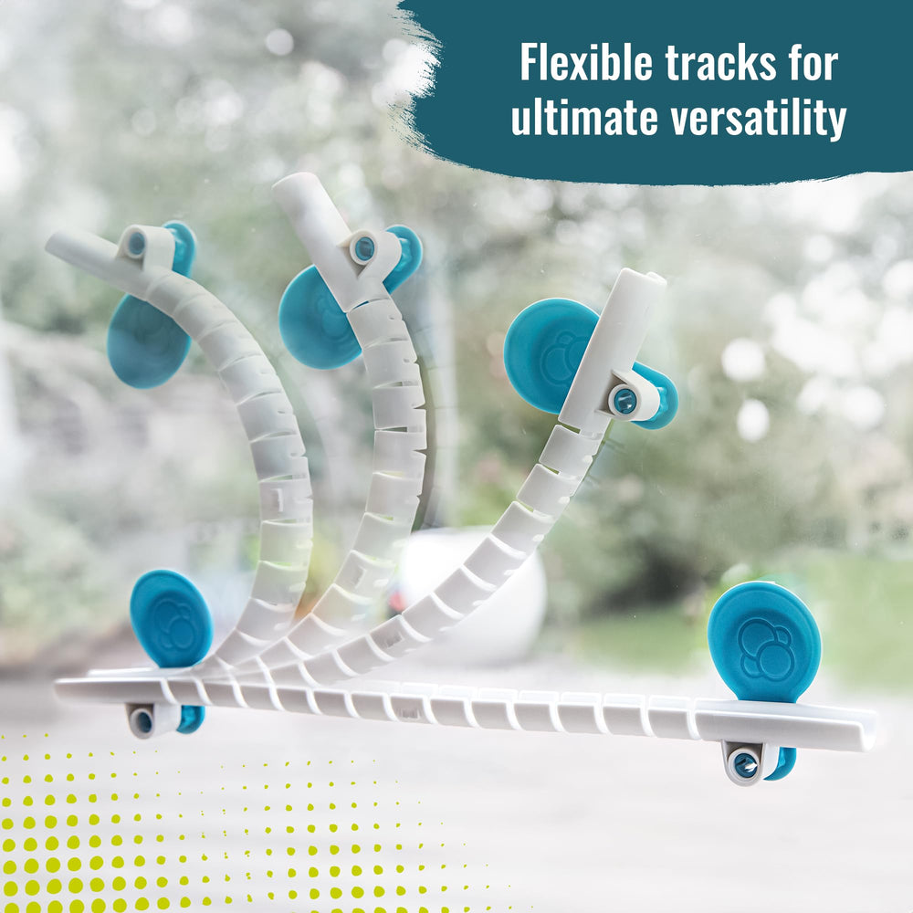 Gecko Run marbles travel along a curved track, showcasing motion and speed.