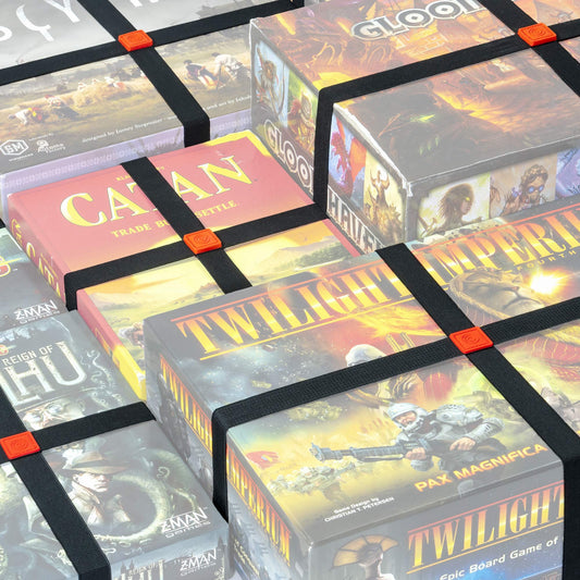 GEEKON premium elastic box bands wrapped on a game box for secure closure.