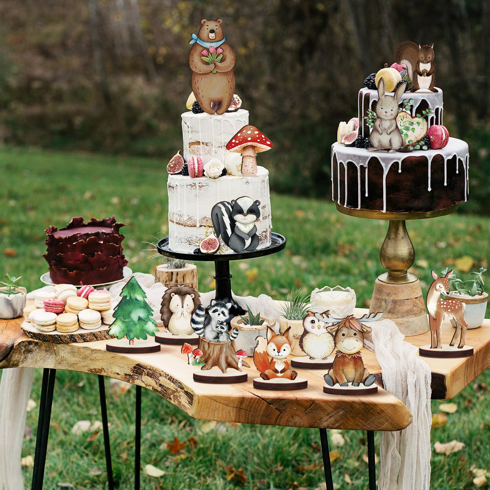 Geetery squirrel cutouts paired with greenery for stylish table decor.
