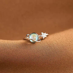 Generic moon star spinner ring aids calm during meetings and busy moments.