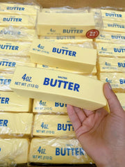 Generic butter-stick squishy in hand promotes calm during work or study