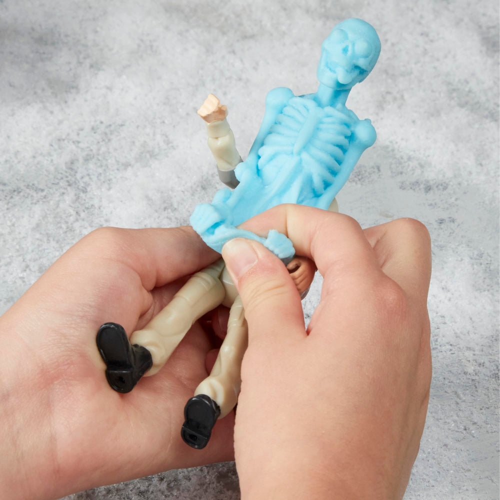 Phoebe Spengler figure packaging for display and gifting.