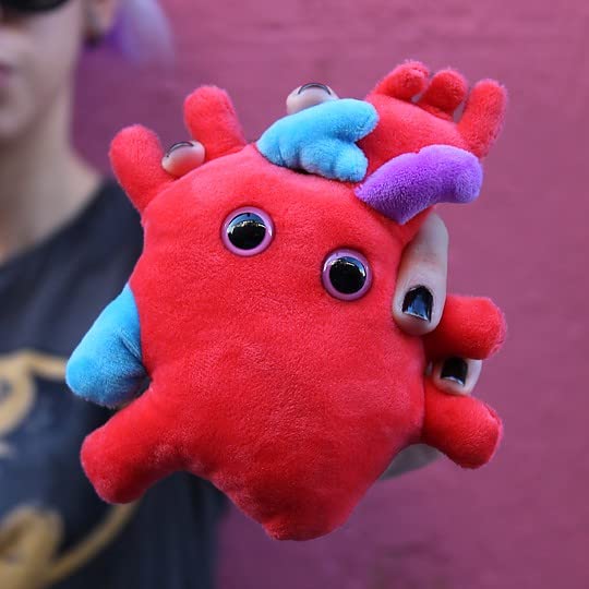 GIANTMICROBES Heart Plush on a desk, ideal office decor and learning tool
